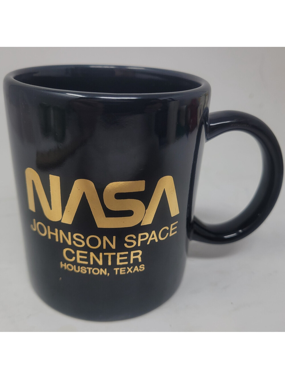 NASA Johnson Space Center Houston Texas Coffee Mug Gold Logo Black Cup 3.75"